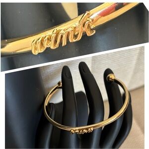 Kate Spade gold “wink” cuff bracelet